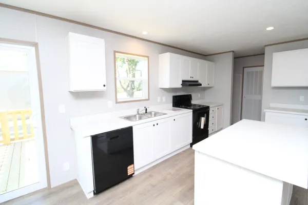 a large white room with a large window