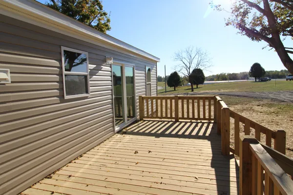 a view of open field with trees