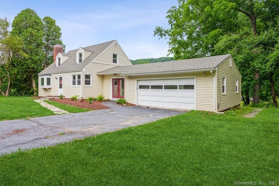 1161 South Britain Road Southbury, CT 06488 - Photo 1 of 1 a front view of a house with a garden and yard