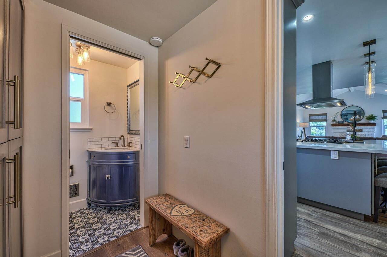 9859 Brookgrass Place Prunedale, CA 93907 - Photo 16 of 39 a room with a sink and a mirror