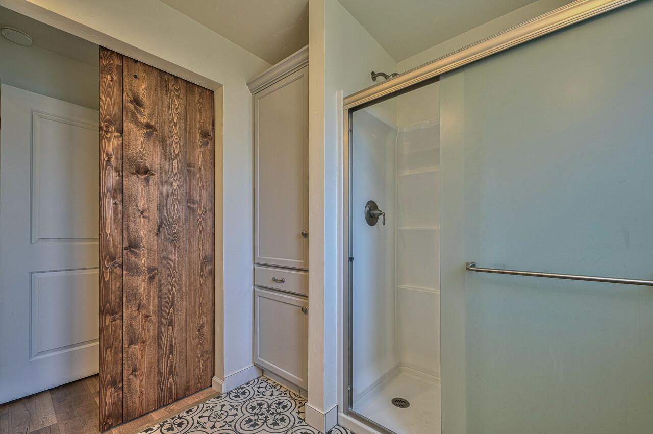 9859 Brookgrass Place Prunedale, CA 93907 - Photo 20 of 39 a bathroom with a shower and a sink