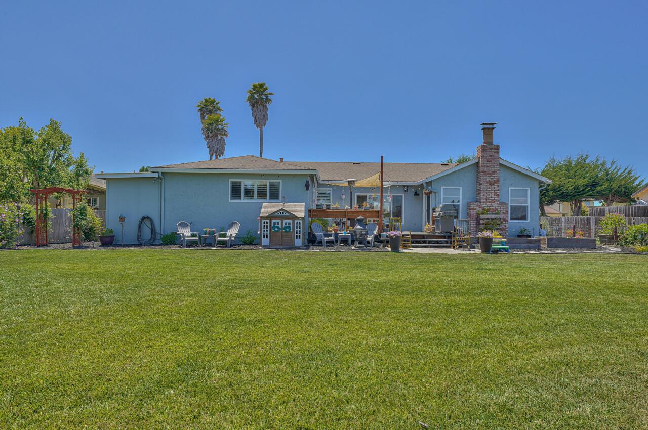 9859 Brookgrass Place Prunedale, CA 93907 - Photo 30 of 39 a front view of a house with a garden