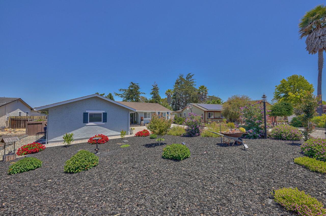 9859 Brookgrass Place Prunedale, CA 93907 - Photo 35 of 39 a group of cars parked in front of a house