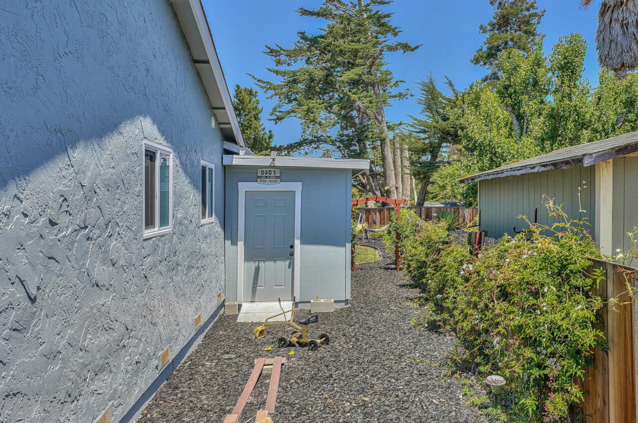 9859 Brookgrass Place Prunedale, CA 93907 - Photo 36 of 39 front view of a house with a tree