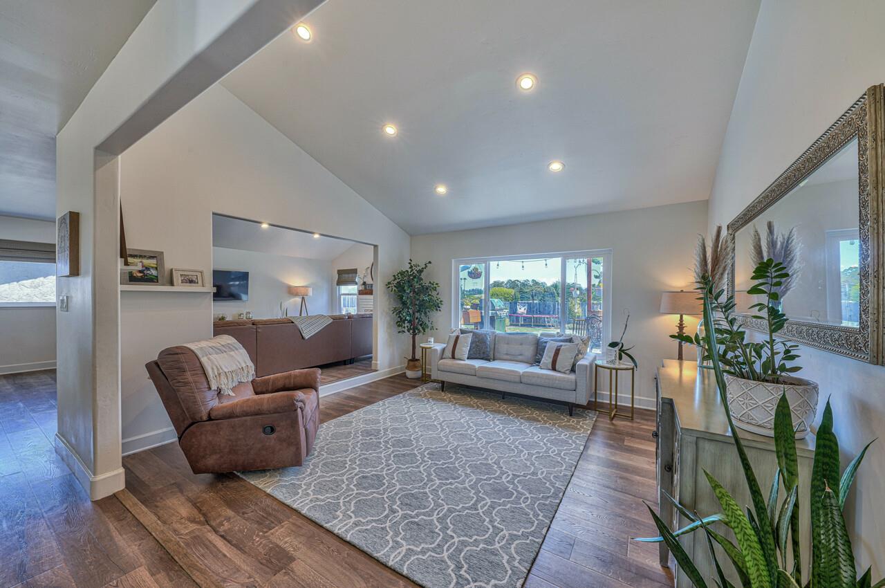 9859 Brookgrass Place Prunedale, CA 93907 - Photo 4 of 39 a living room with furniture rug and a large window