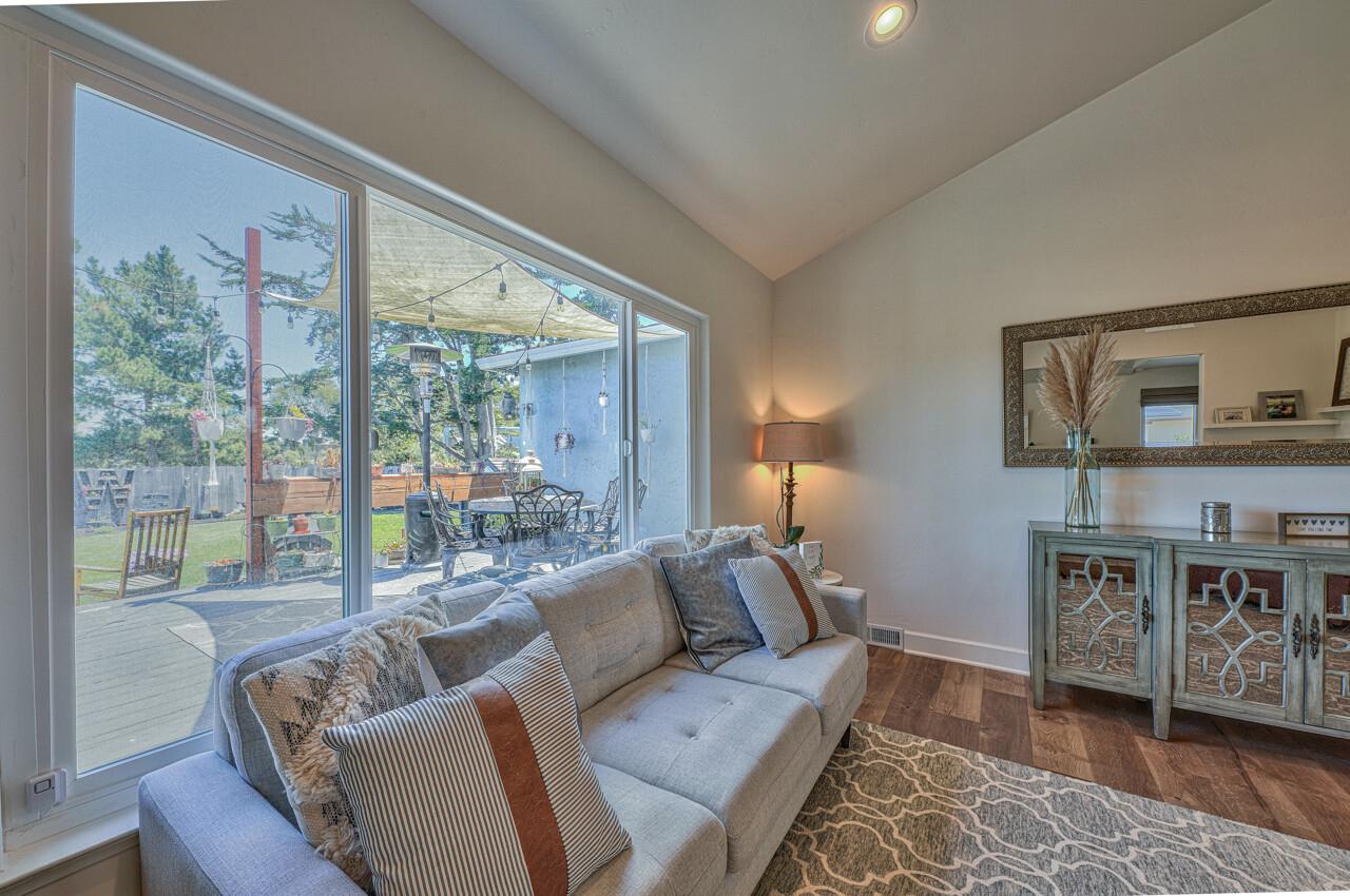 9859 Brookgrass Place Prunedale, CA 93907 - Photo 5 of 39 a living room with furniture and a floor to ceiling window