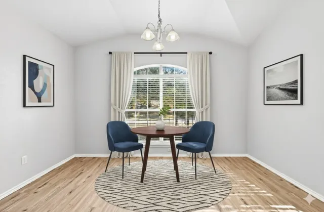 a chairs and a table in a room