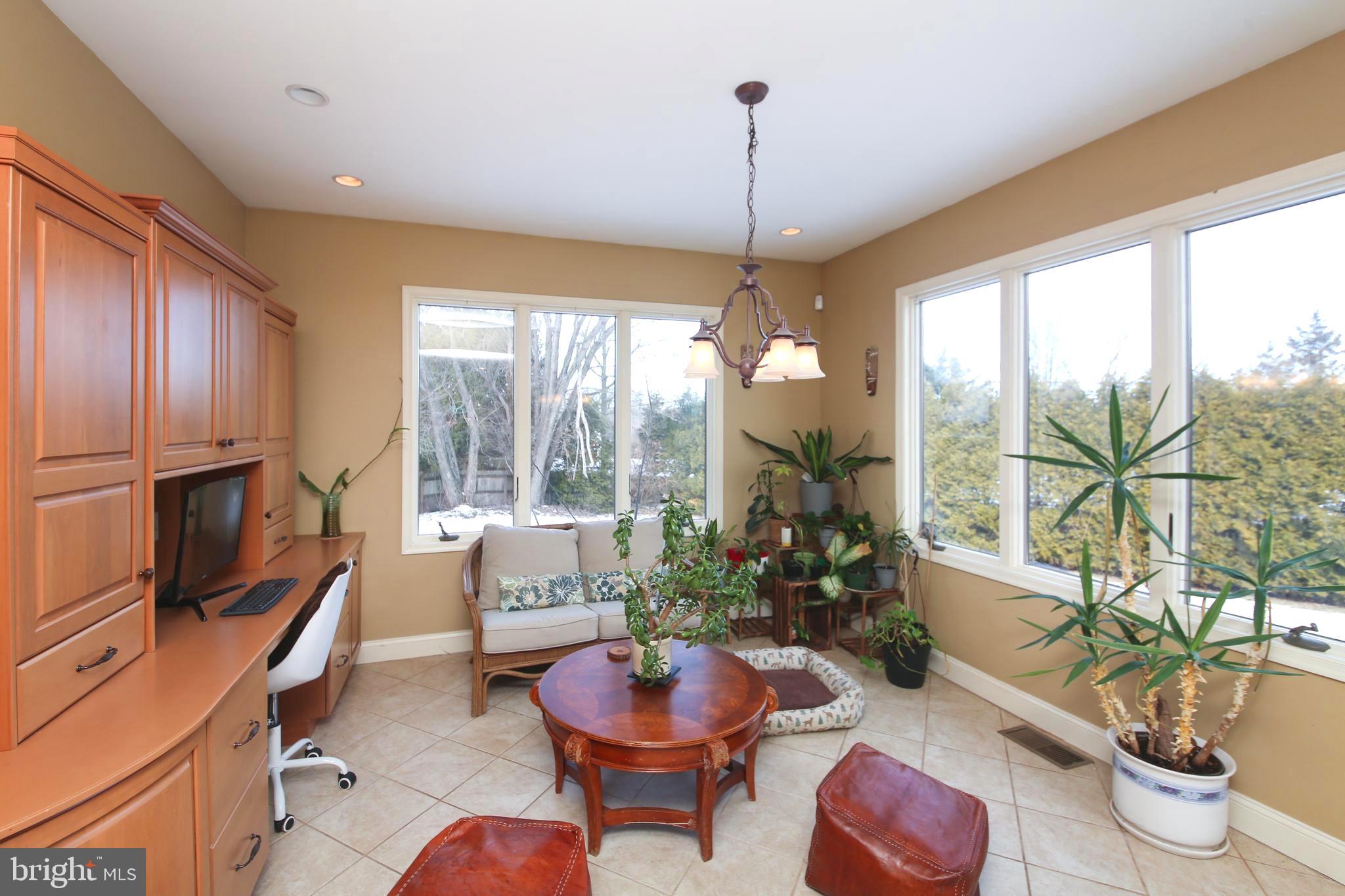 531 Hunsicker Road Telford, PA 18969 - Photo 15 of 32 a living room with fireplace furniture and a large window