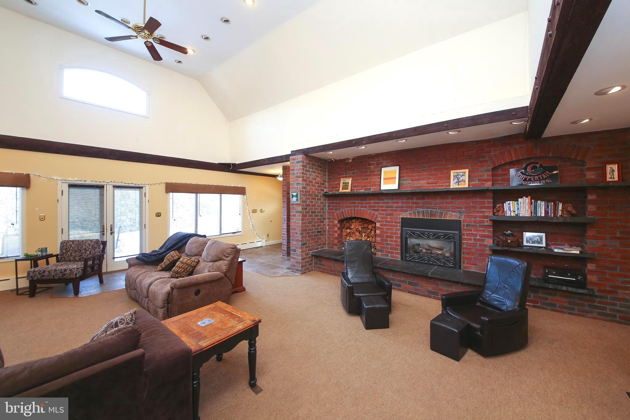 531 Hunsicker Road Telford, PA 18969 - Photo 18 of 32 a living room with furniture and a fireplace