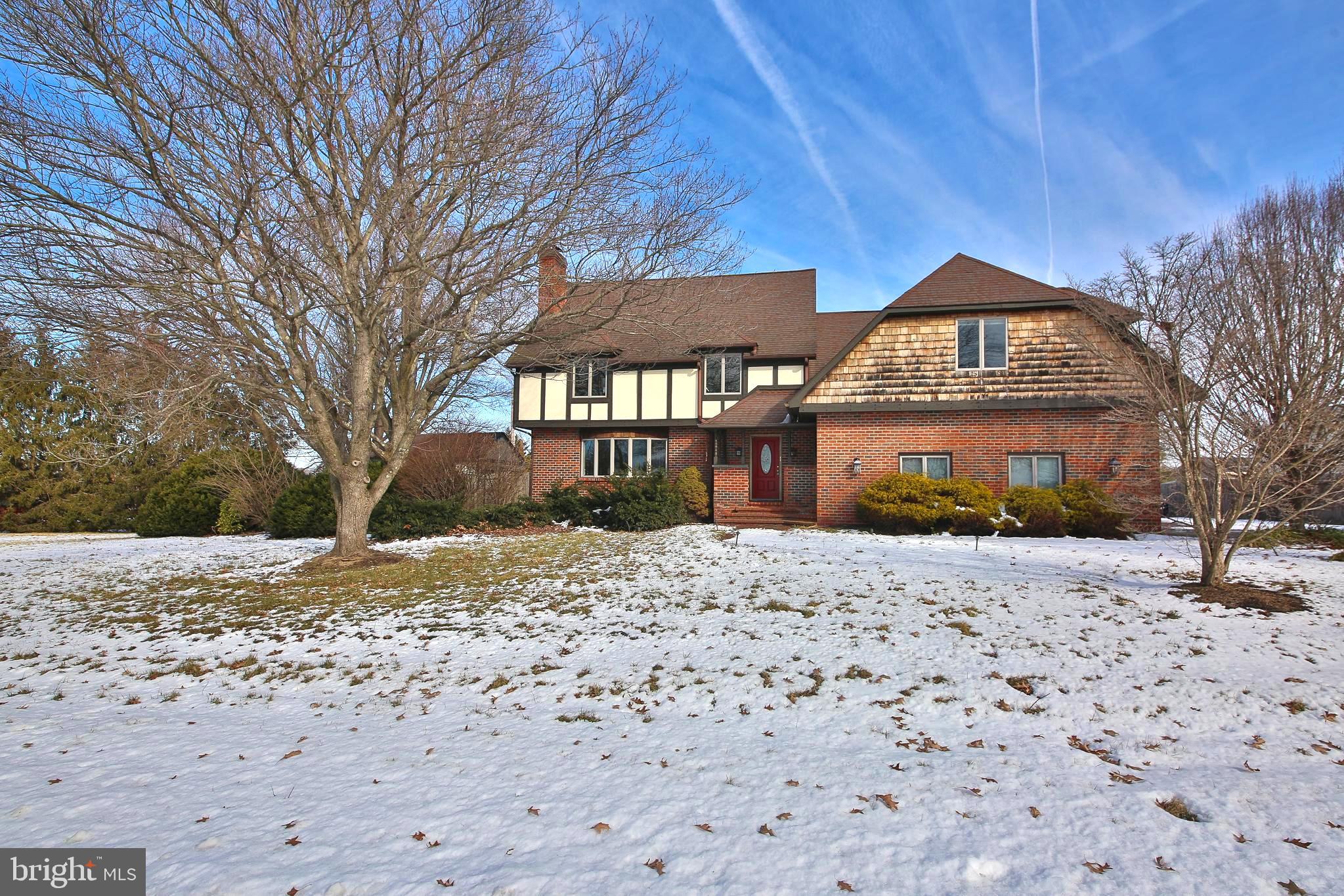 531 Hunsicker Road Telford, PA 18969 - Photo 2 of 32 a front view of a house with a yard