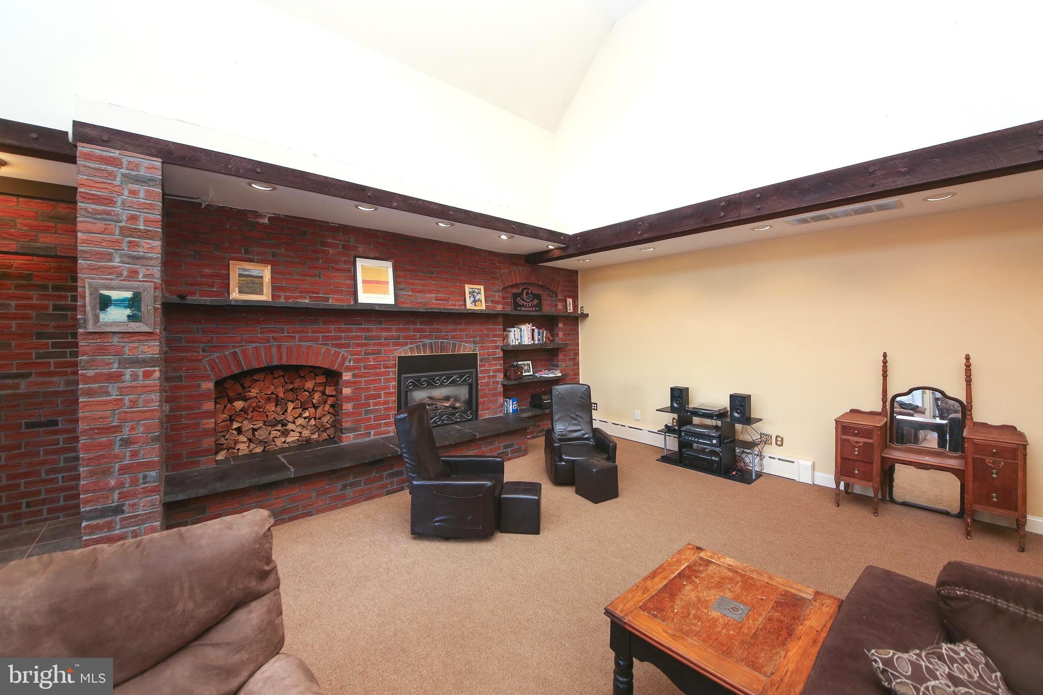 531 Hunsicker Road Telford, PA 18969 - Photo 21 of 32 a living room with furniture and a fireplace