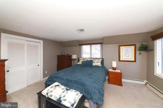 a living room with furniture and window