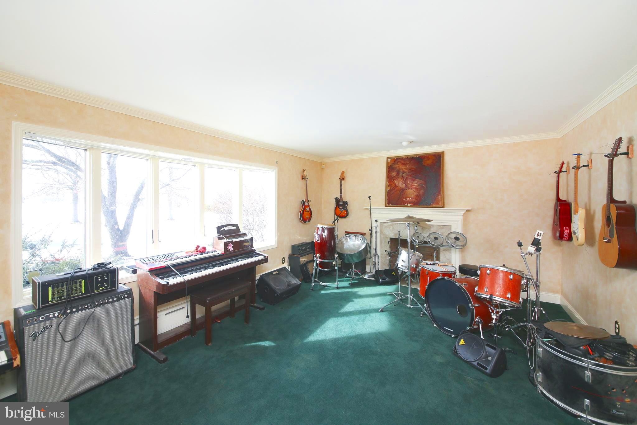 531 Hunsicker Road Telford, PA 18969 - Photo 8 of 32 a room with furniture a flat screen tv and a window