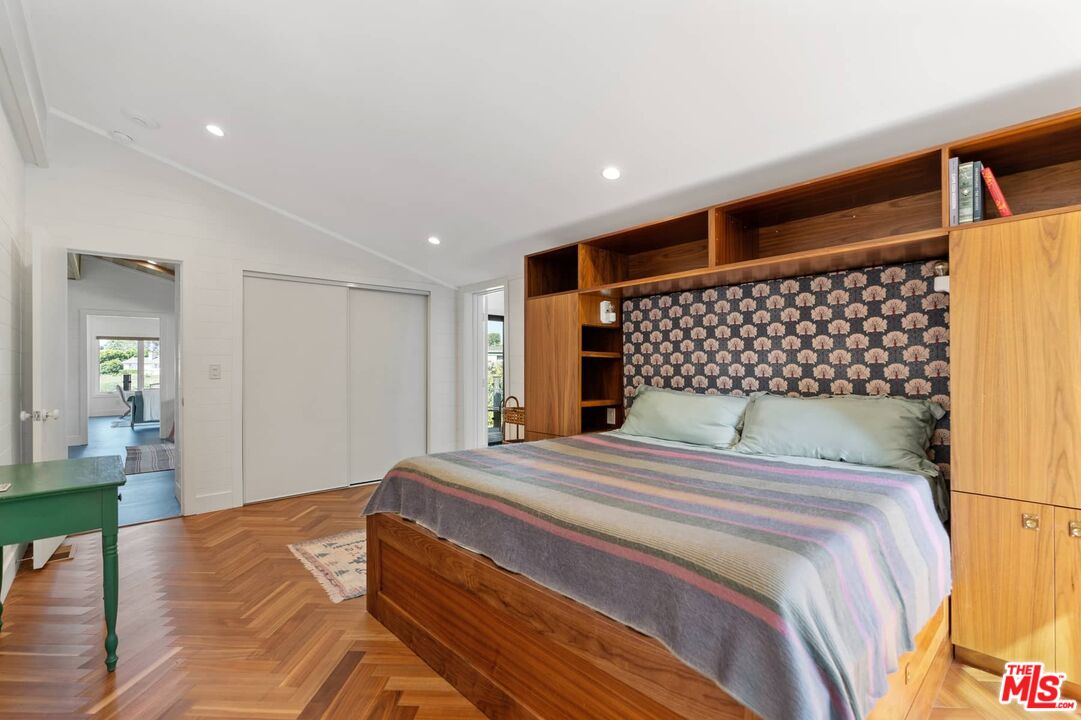 249 Paradise Cove Road Malibu, CA 90265 - Photo 20 of 41 a bedroom with a bed and a view of living room
