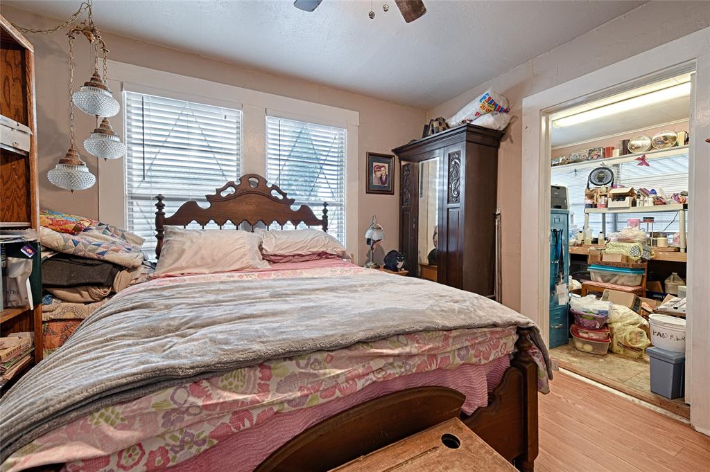 205 West Stark Road Seagoville, TX 75159 - Photo 15 of 39 a bedroom with a bed and a large mirror with the outer view