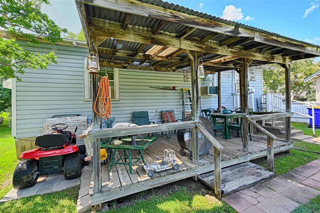 205 West Stark Road Seagoville, TX 75159 - Photo 23 of 39 a view of a chairs and table in the patio
