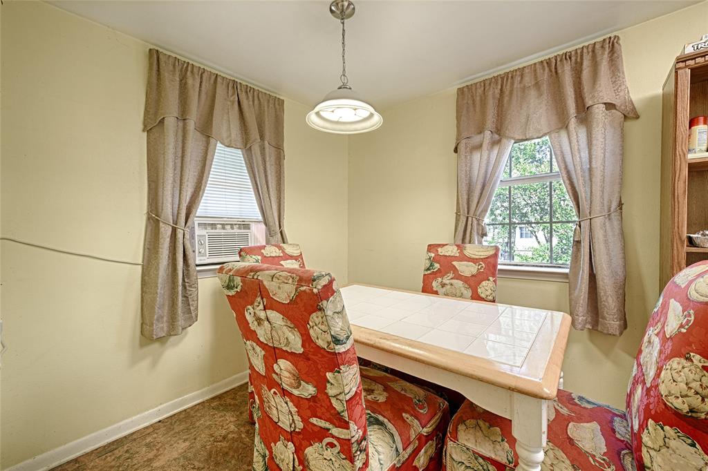 205 West Stark Road Seagoville, TX 75159 - Photo 30 of 39 a view of a dining room with furniture window and outside view