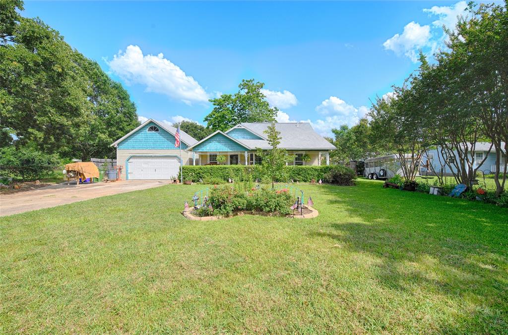 205 West Stark Road Seagoville, TX 75159 - Photo 3 of 39 a front view of a house with garden