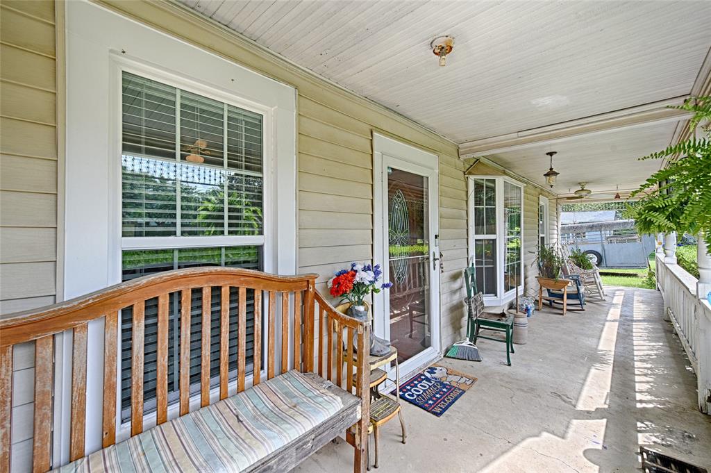 205 West Stark Road Seagoville, TX 75159 - Photo 4 of 39 a view of a patio with couches chairs and potted plants