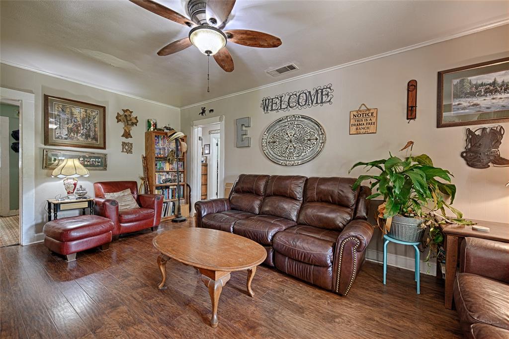 205 West Stark Road Seagoville, TX 75159 - Photo 5 of 39 a living room with furniture and a wooden floor