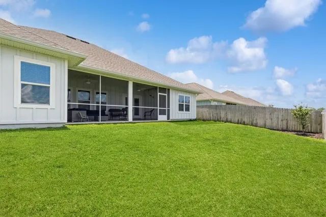 a picture of a bathroom with a shower