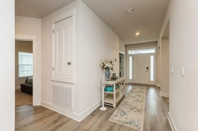 a view of livingroom with wooden floor