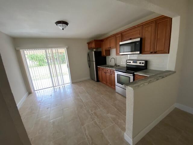 601 Silver Beach Road, Unit 609 Riviera Beach, FL 33403 - Photo 2 of 10 IMG_1259