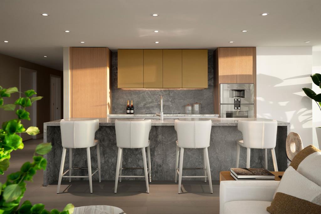 500 Alton Road, Unit 3903 04 Miami Beach, FL 33139 - Photo 13 of 72 a view of a dining room with furniture and wooden floor