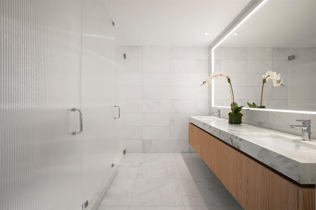 500 Alton Road, Unit 3903 04 Miami Beach, FL 33139 - Photo 21 of 72 a bathroom with a granite countertop sink a toilet and shower