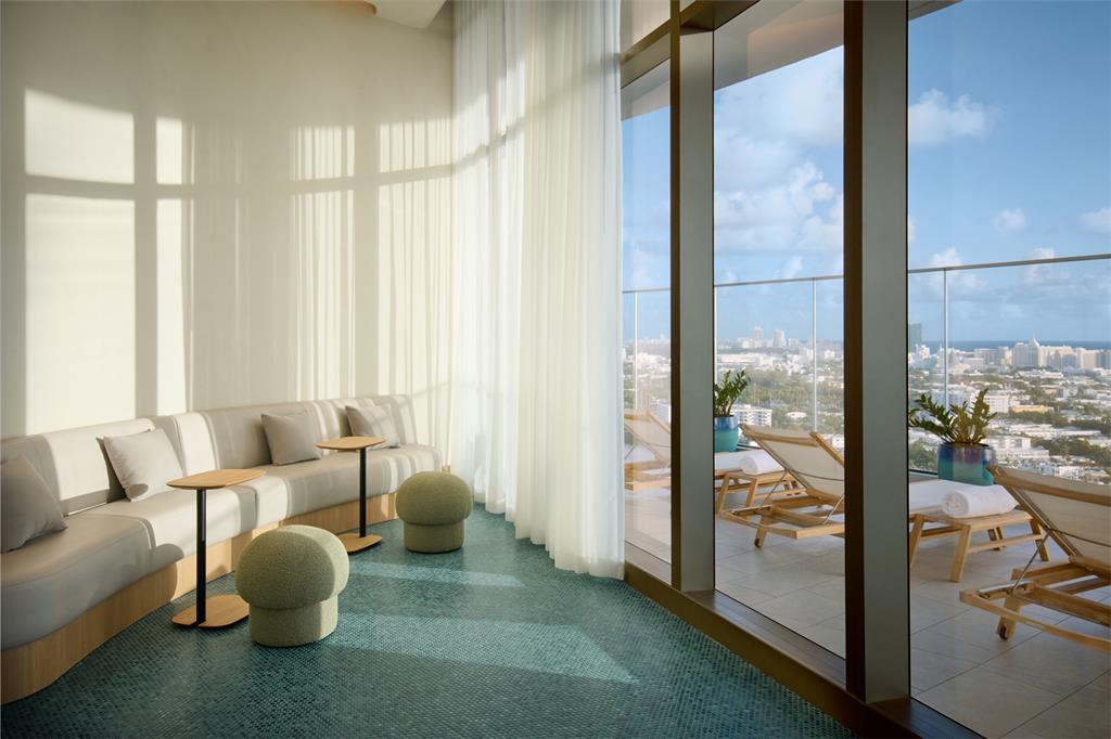 500 Alton Road, Unit 3903 04 Miami Beach, FL 33139 - Photo 46 of 72 a living room with furniture and a large window