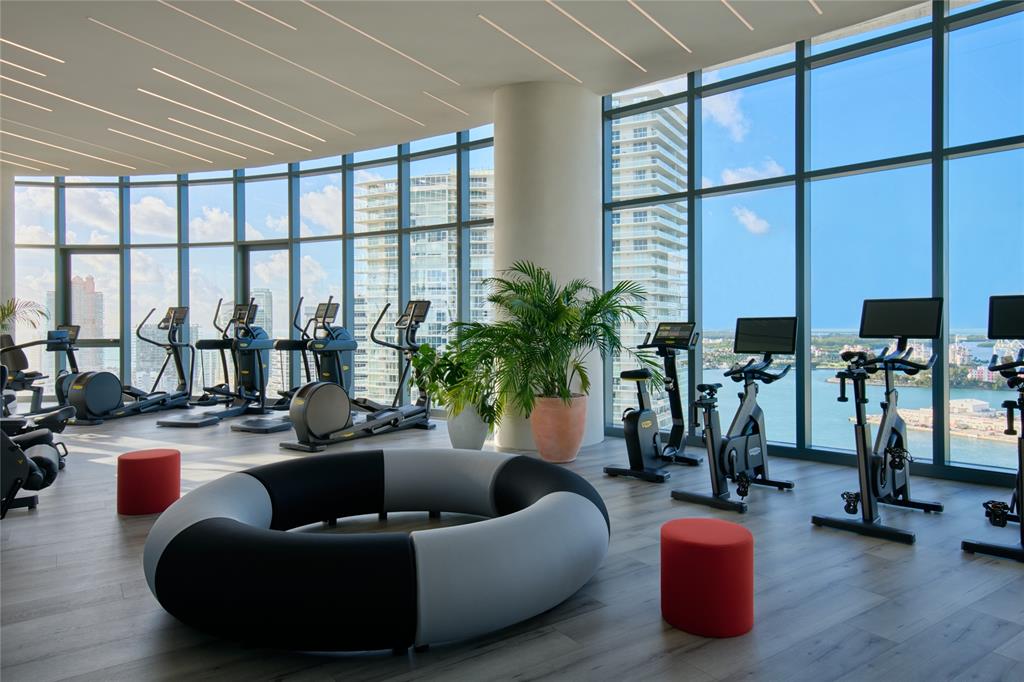 500 Alton Road, Unit 3903 04 Miami Beach, FL 33139 - Photo 48 of 72 a lobby with furniture and floor to ceiling window