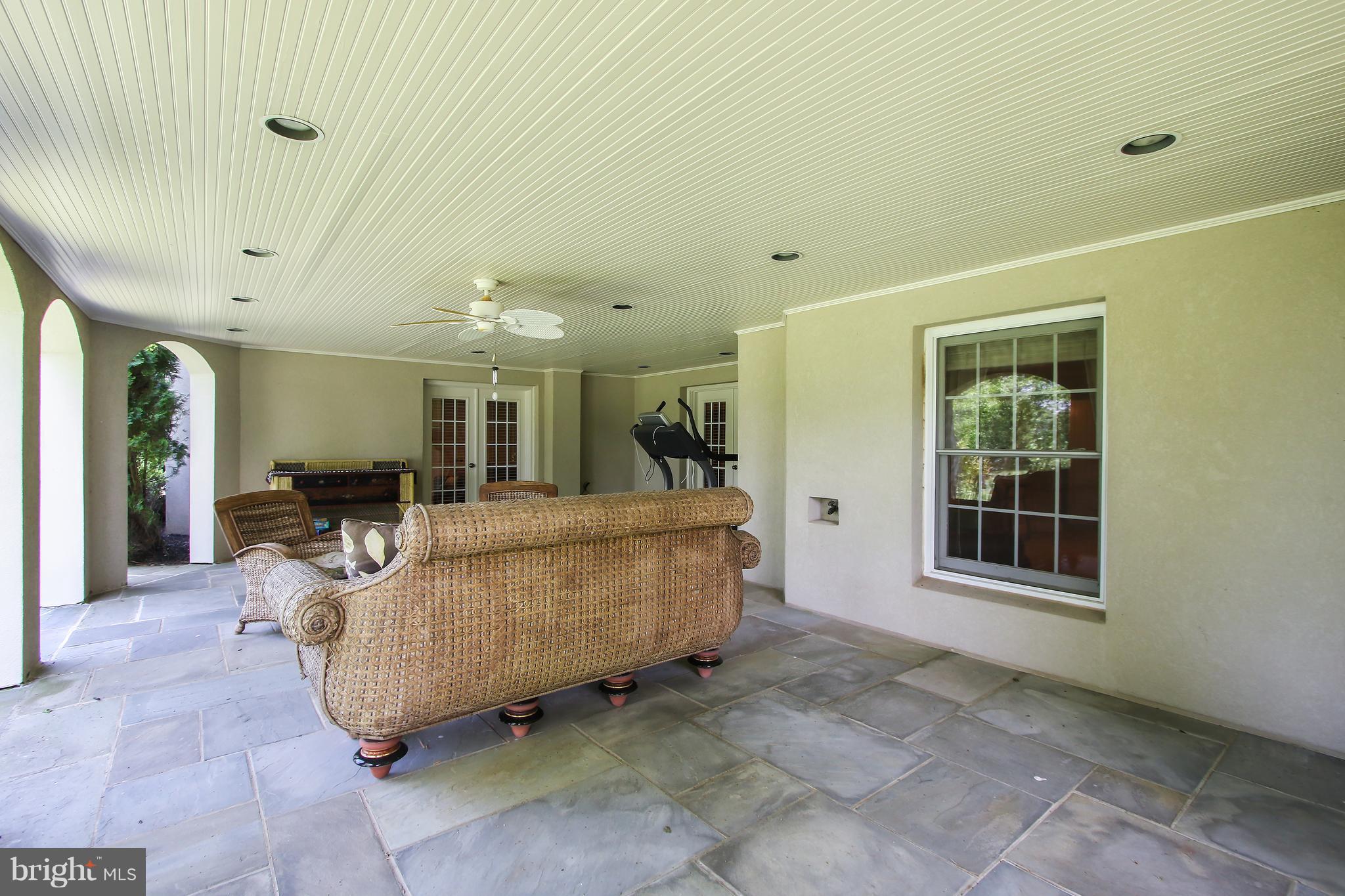 8322 Roxborough Loop Gainesville, VA 20155 - Photo 28 of 37 Slate Stone Covered Patio