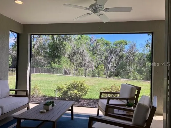a view of a lot of furniture and a window
