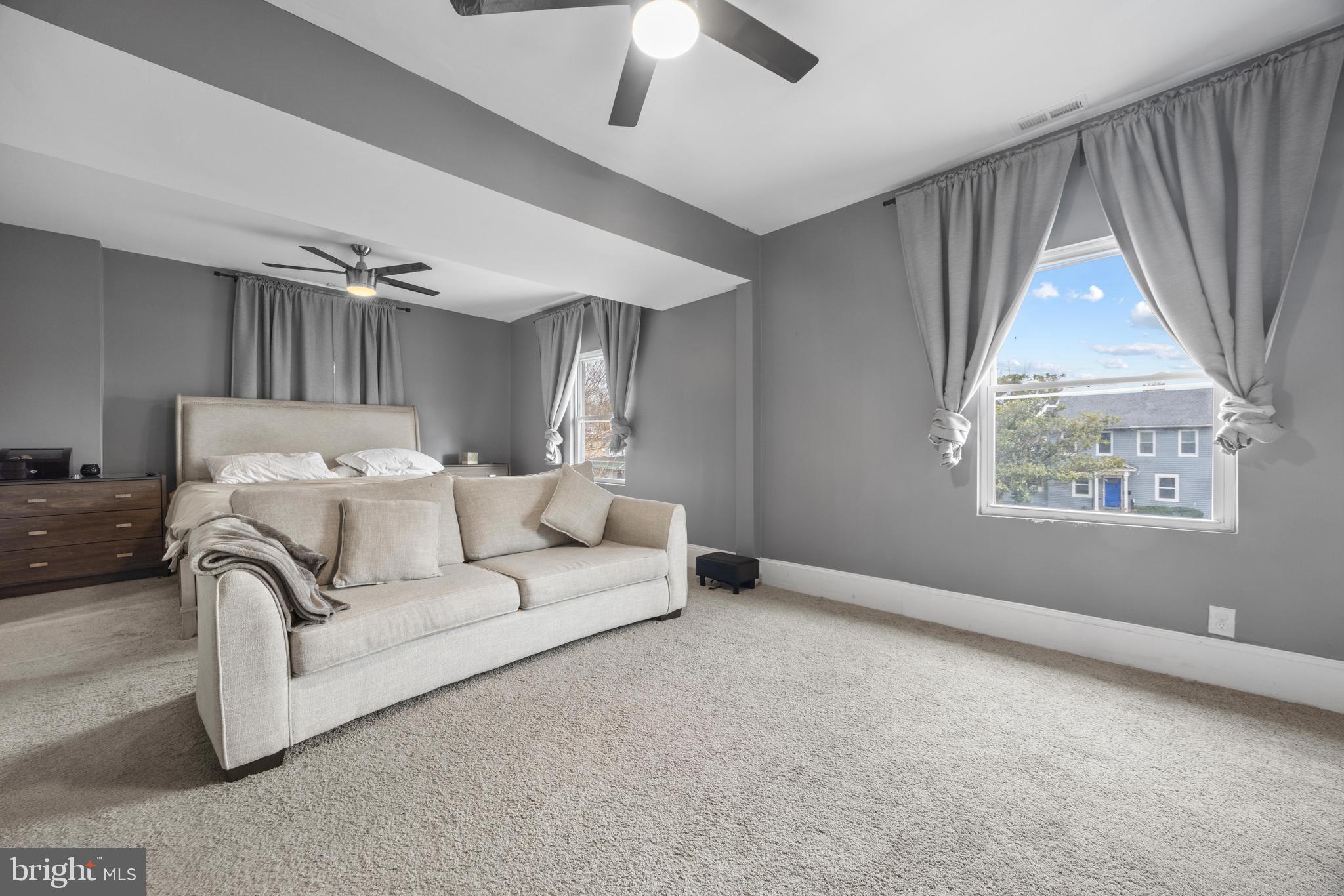 3814 Chatham Road Baltimore, MD 21215 - Photo 19 of 45 a living room with furniture and a window