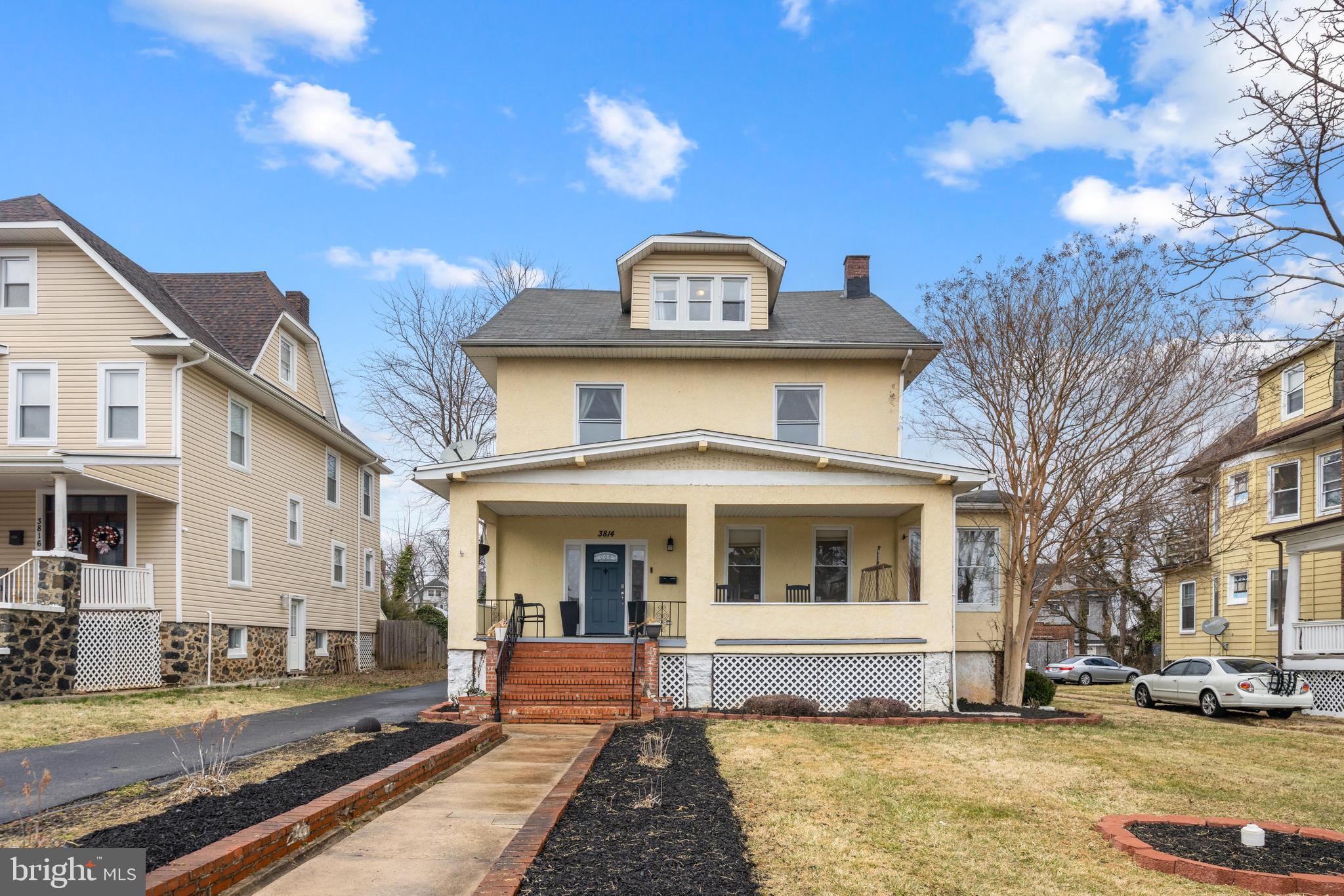 3814 Chatham Road Baltimore, MD 21215 - Photo 2 of 45 a front view of a house with a yard