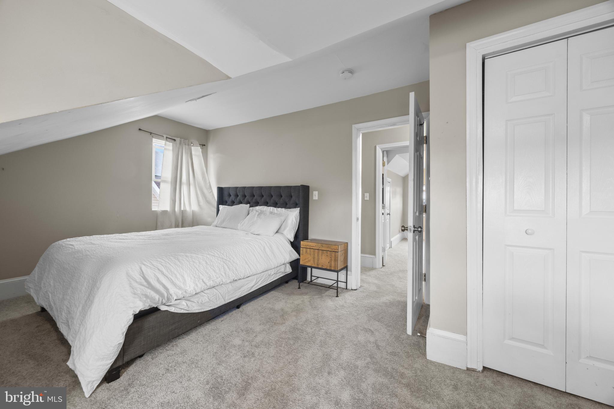 3814 Chatham Road Baltimore, MD 21215 - Photo 26 of 45 a bedroom with a bed and window