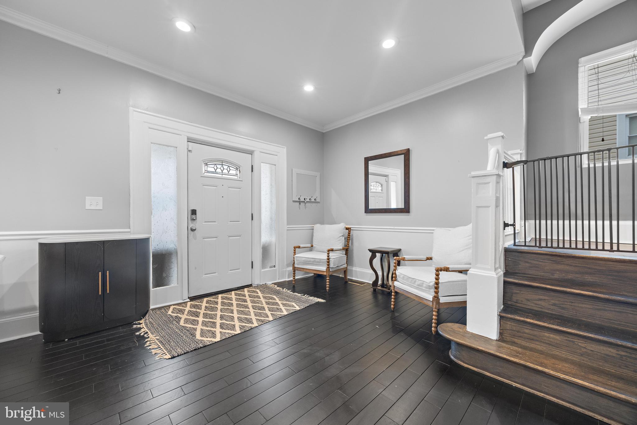 3814 Chatham Road Baltimore, MD 21215 - Photo 4 of 45 a living room with furniture and a wooden floor