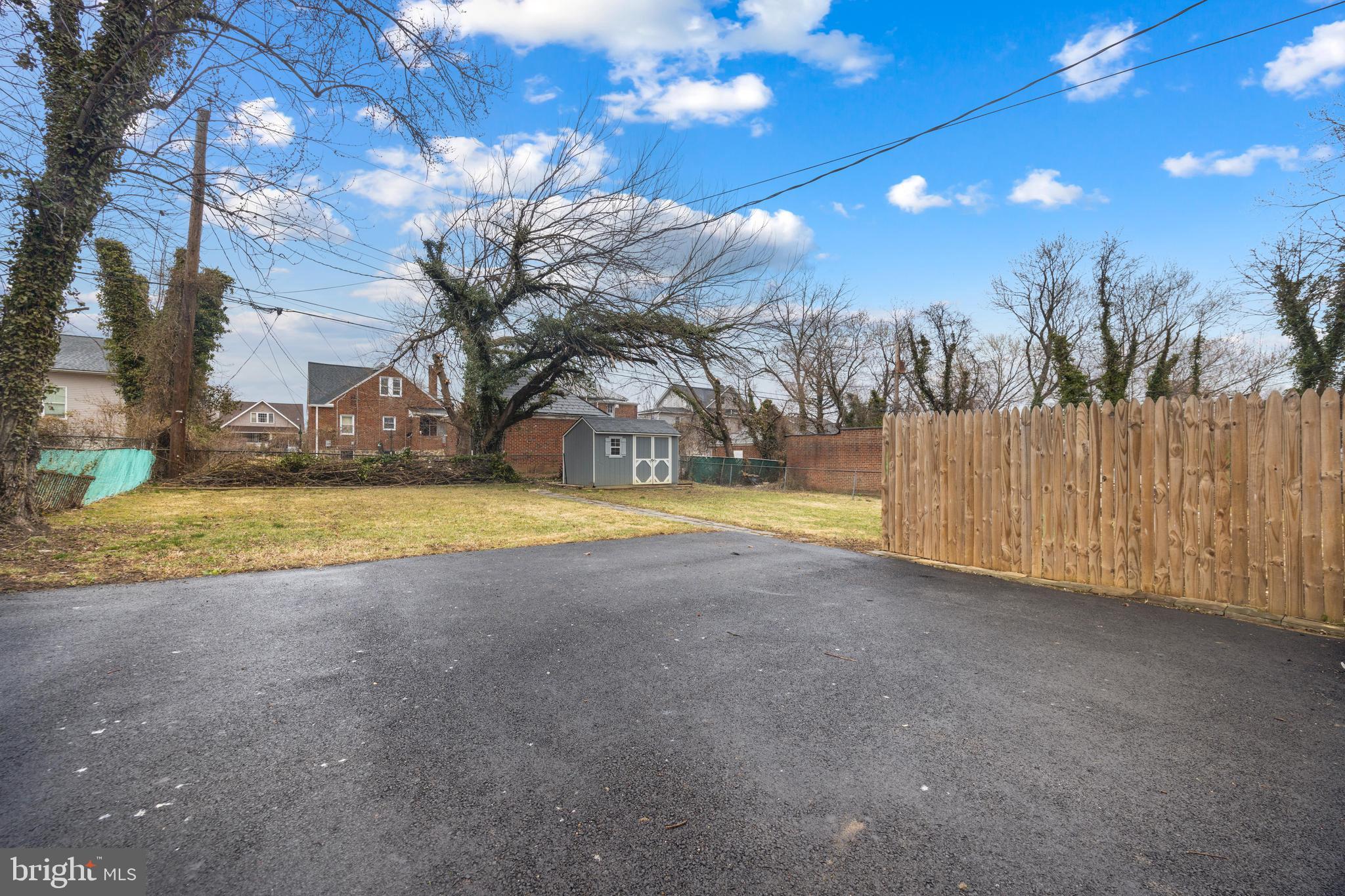 3814 Chatham Road Baltimore, MD 21215 - Photo 44 of 45 a view of swimming pool with an outdoor space and seating area