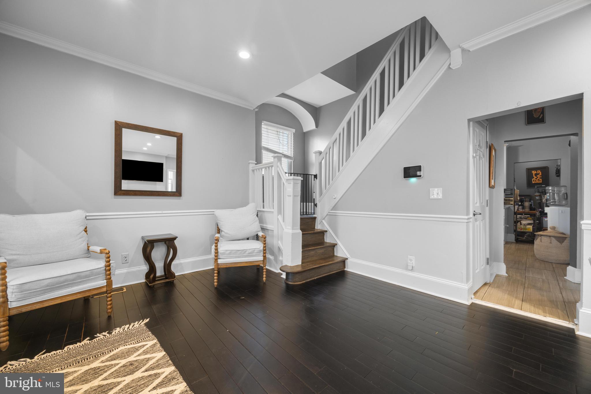 3814 Chatham Road Baltimore, MD 21215 - Photo 5 of 45 a view of a livingroom with furniture and wooden floor