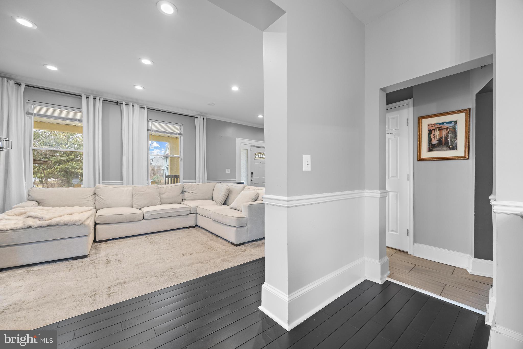 3814 Chatham Road Baltimore, MD 21215 - Photo 8 of 45 a living room with furniture and a large window