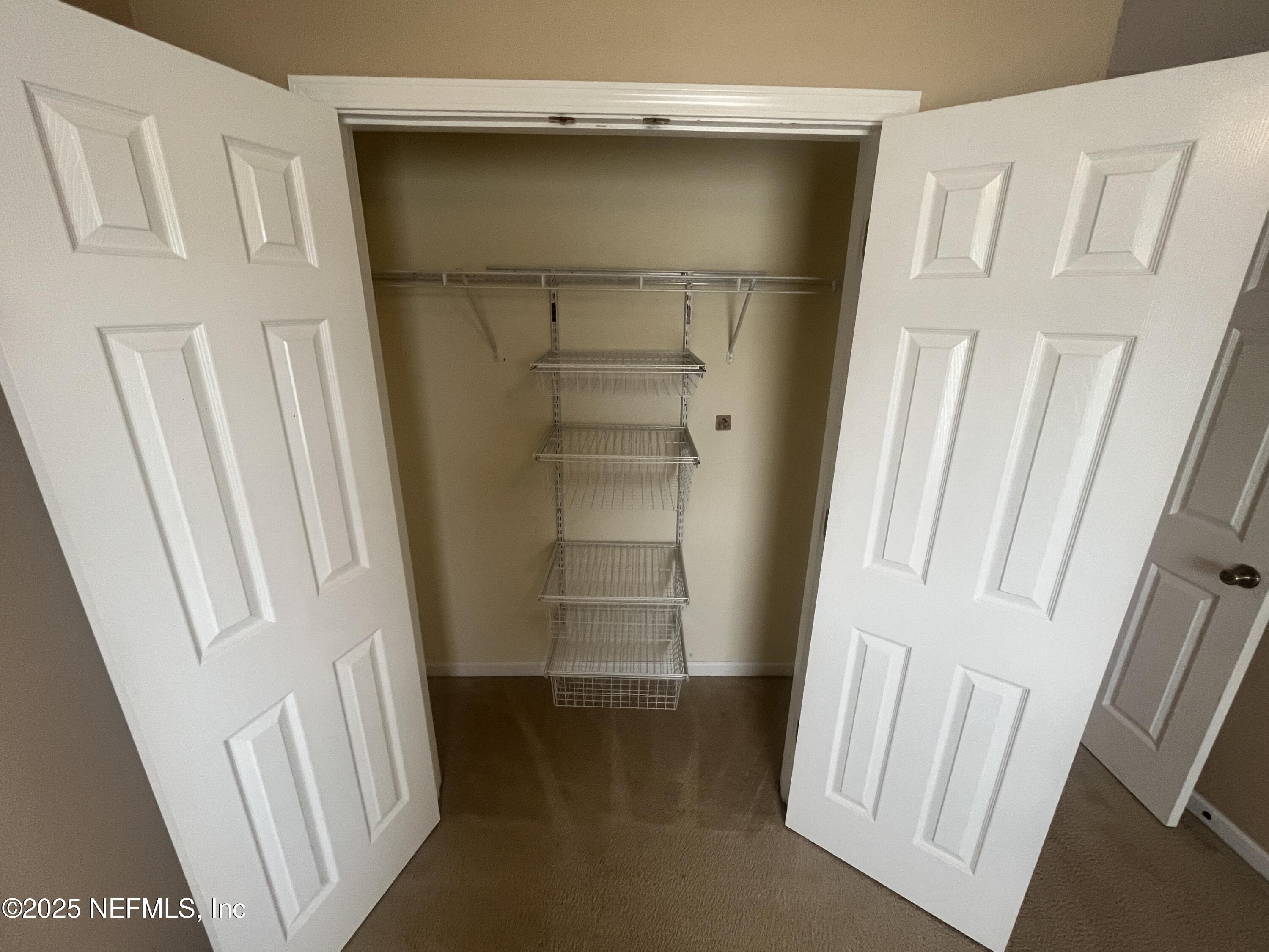 1500 Calming Water Drive, Unit 5201 Fleming Island, FL 32003 - Photo 35 of 39 a view of closet area