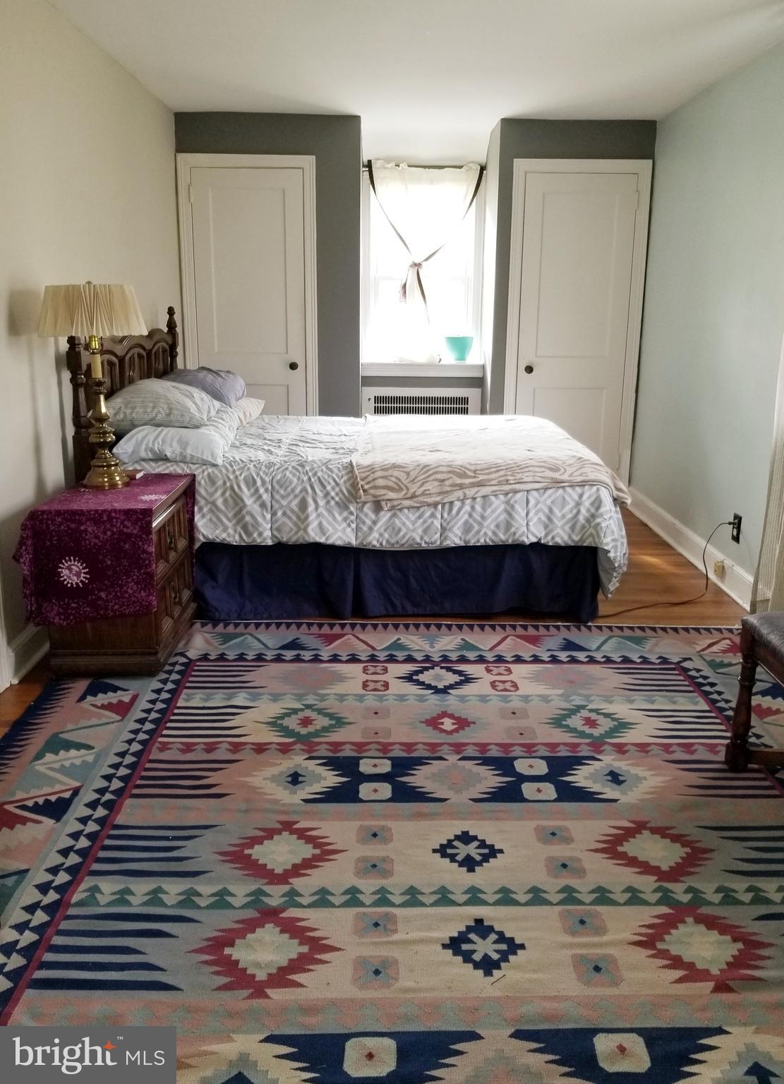 211 Ridley Drive Wallingford, PA 19086 - Photo 11 of 12 a bedroom with bed and window