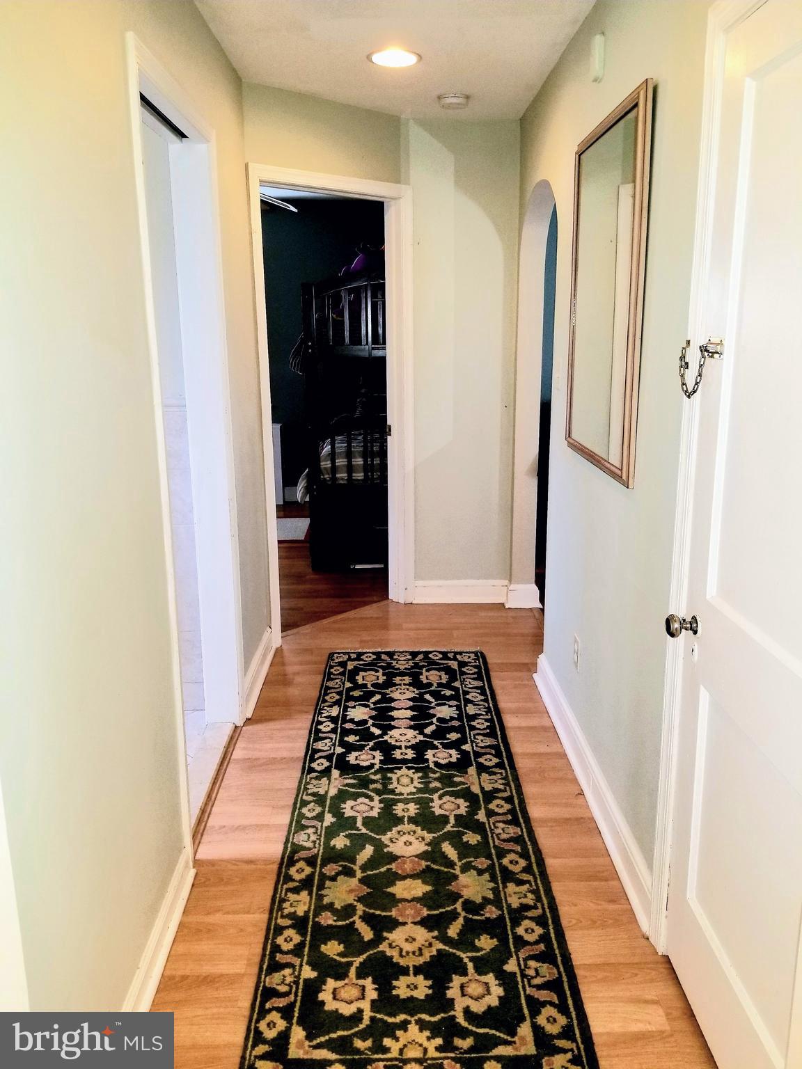 211 Ridley Drive Wallingford, PA 19086 - Photo 6 of 12 a bathroom with a black and white checkered floor