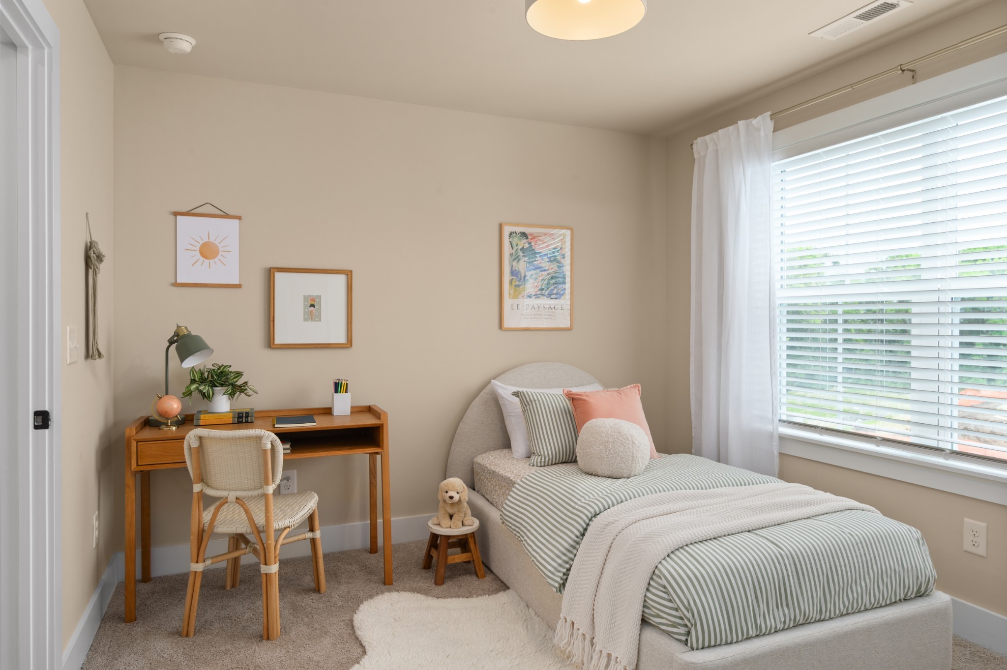 245 Nesbitt Lane Madison, TN 37115 - Photo 15 of 21 a bedroom with a bed and a table in it