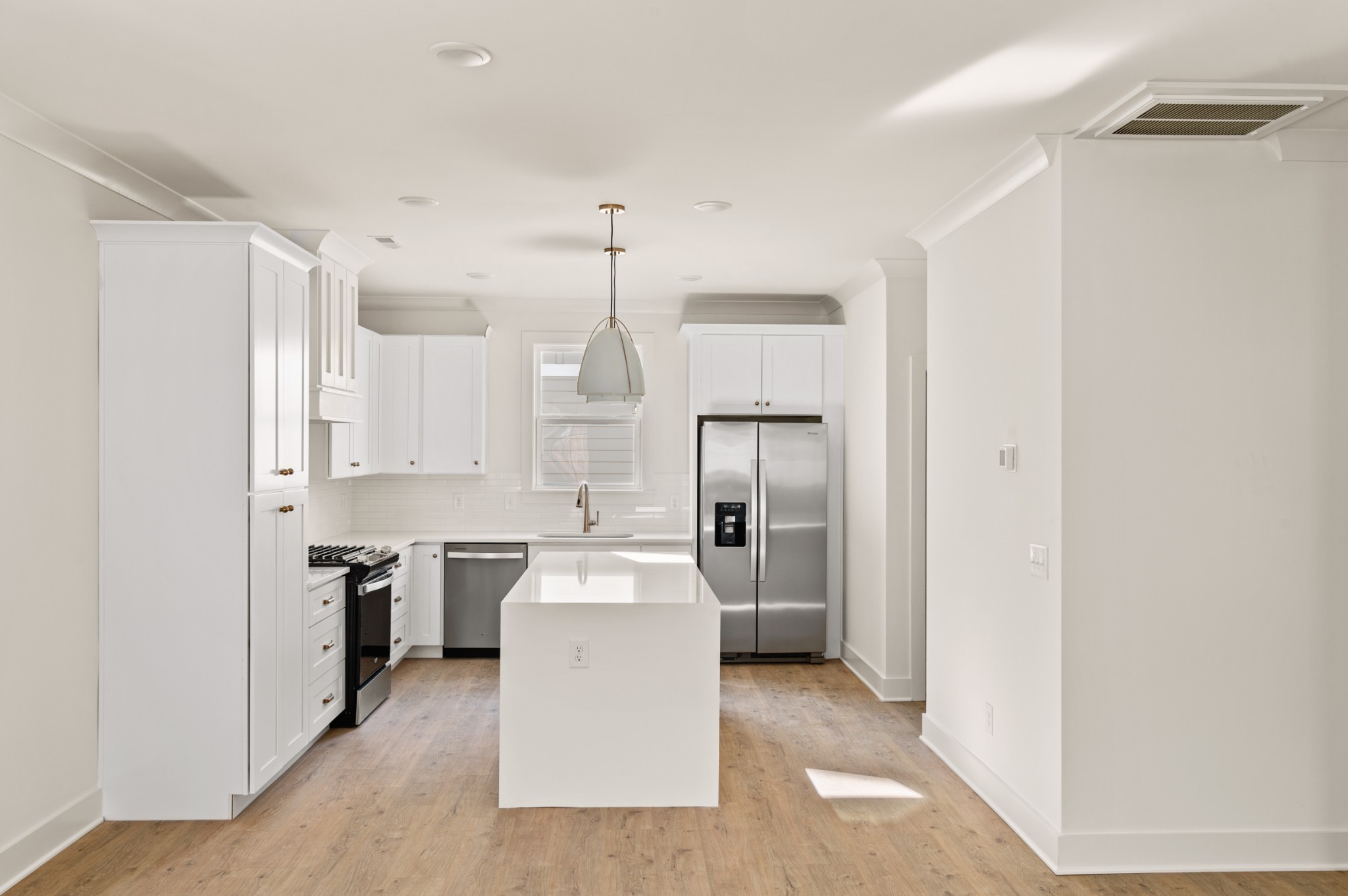 245 Nesbitt Lane Madison, TN 37115 - Photo 2 of 21 a kitchen with cabinets and stainless steel appliances