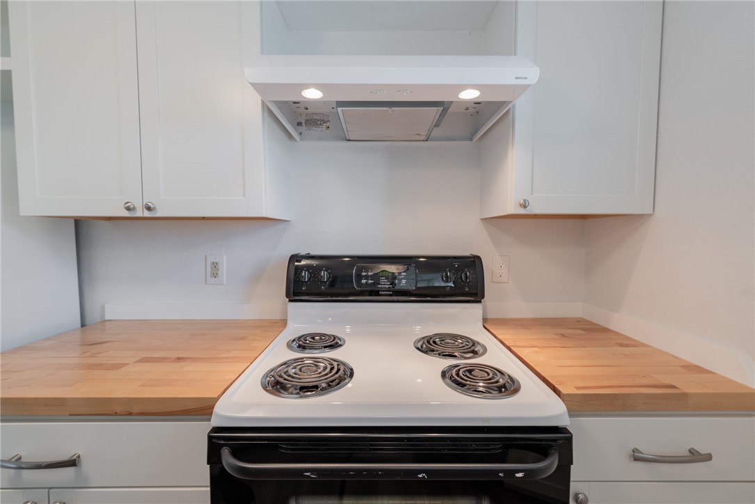 2500 Burleson Road, Unit 614 Austin, TX 78741 - Photo 8 of 20 a view of a stove top oven sitting inside of a kitchen