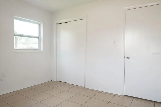 a view of an empty room with window