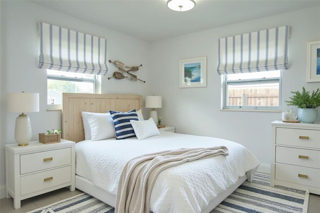 6013 Francis Drive Apollo Beach, FL 33572 - Photo 5 of 20 a bedroom with a bed and a window dresser