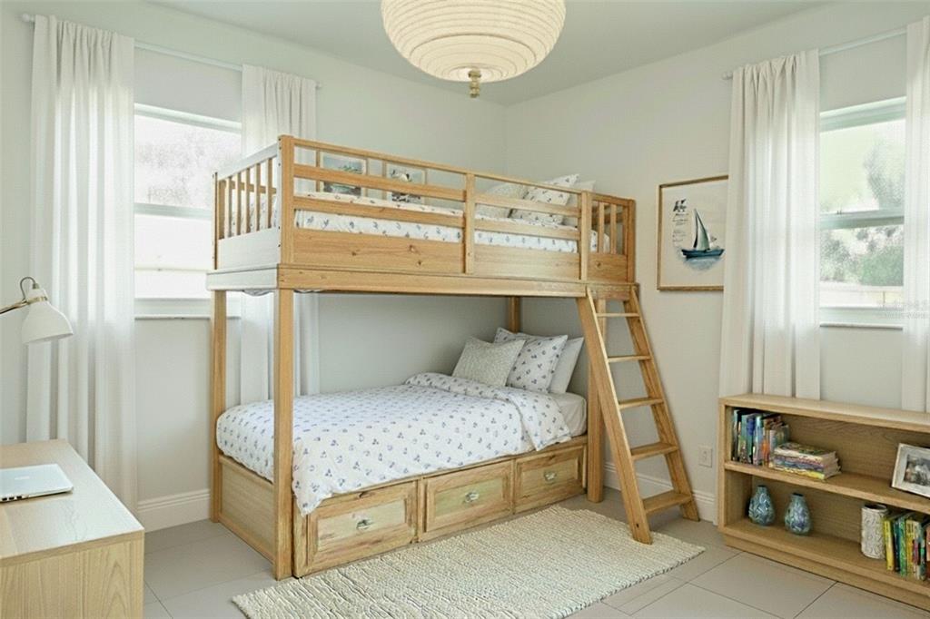 6013 Francis Drive Apollo Beach, FL 33572 - Photo 6 of 20 a bedroom with a bed and a window