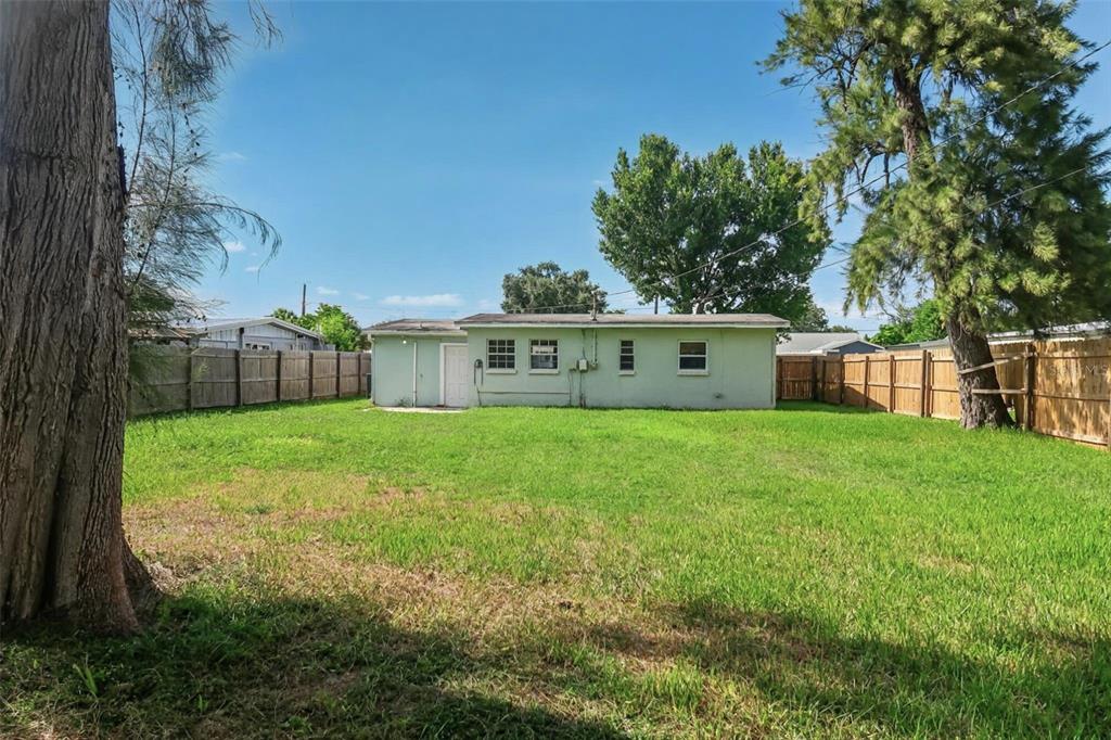 6013 Francis Drive Apollo Beach, FL 33572 - Photo 8 of 20 a view of house with backyard